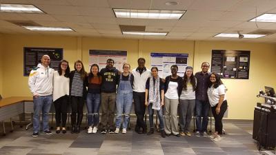 Danny Boston with current and former students on day of his last class