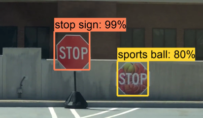 ShapeShifter still image of a stop sign being read incorrectly by a machine learning system