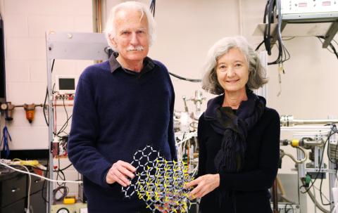 Walter de Heer and Claire Berger with a model of how computer chip material is made (Photo Jess Hunt-Ralston)