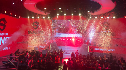 Crowd celebrating the winner at an esports event