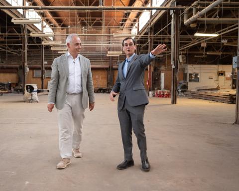 President Ángel Cabrera and Assoc Vice Provost for the Arts Jason Freeman tour the old Randall Brothers' building, which is part of the new Creative Quarter