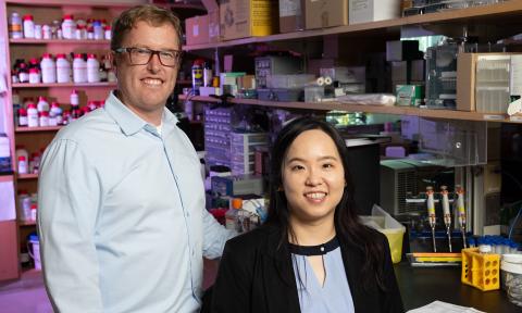 Brandon Dixon and Shao-Yun Hsu pose in their lab, where they're working on a project to improve lymph node transplant surgery.