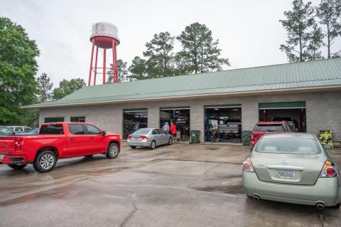 This image shows vehicles outside of Butler's Tire & Lube in Pembroke, Georgia