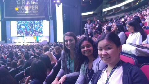 Caitlyn Caggia, Lakshmi Raju, and Delgermaa Nergui in the audience at Grace Hopper.