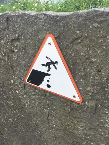Stick Figure Sign on the Irish Cliffs of Moher