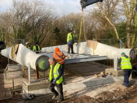 Blade bridge under construction in Ireland, used two repurposed wind turbine blades as major structural components.  Photo credit: Re-Wind Network