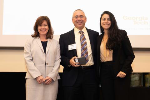 photograph of CoE Associate Dean Robert Butera (center) with Andrea Vargas (right), president of ANAK, and Lynn Durham (left), ANAK faculty advisor and associate vice president and chief of staff for the President's Office.