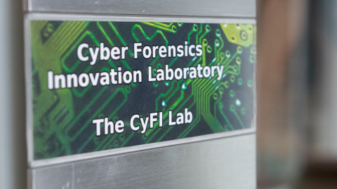 Sign reading Cyber Forensics Innovation Laboratory The CyFI Lab