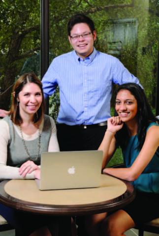 Dima Nazzal, ISyE director of student services, works with undergraduate students Misha Desai and Ethan Smith as they continue the research they began in their freshman year through the new Grand Challenges program at Georgia Tech.