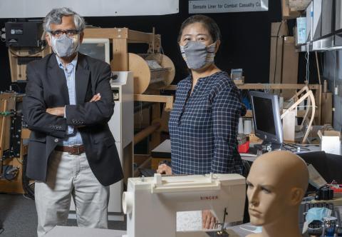 Researchers wearing redesigned face mask