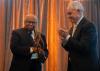 Retired Justice Robert Benham receives the Ivan Allen Prize from President Cabrera