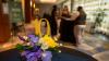 Entrance area at the 10th annual Distinguished Alumni Awards with a flower centerpiece and the number 10