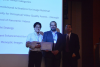 Haohong Wang (right), of TCL Research America and chair of the 10K Best Paper Award competition, recognizes Gukyeong Kwon and ECE Professor Ghassan AlRegib at the 2017 IEEE International Conference on Multimedia and Expo.