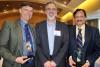 Ross Ethier, Coulter Department chair (center) congratulates BME faculty Joe Le Doux (left) and Bala Pai (right) who were honored by Georgia Tech for their excellent work.