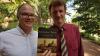 A photograph of authors David Morton and Matthew Hild holding up a copy of their book, Georgia Tech