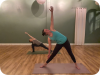 Dori Pap practices yoga with yoga instructor Lindsey Hammond.