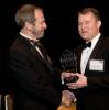 J.Chris Gaffney (right) receives Distinguished Engineering Alumni Award from Dean Giddens