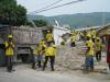 Workers remove debris in Haiti