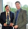 Pictured are Coulter BME faculty Joe Le Doux (left) and Bala Pai (right) who were honored by Georgia Tech for their teaching excellence. BME Professor Younan Xia and associate professor Manu Platt were also honored at the event.