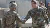  Gen. James McConville, right, greets a soldier from the 4th Infantry Division in Laghman Province, Afghanistan, in October 2018. (Photo: Spc. Markus Bowling, U.S. Army)