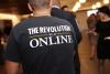 OMSCS t-shirt reading "the revolution is online"