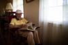 Roy Bethune, 106 years old, looks at his 1937 Georgia Tech yearbook. 