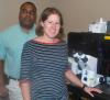 Christine Payne, PhD, and Steve Woodard with the Petit Institute's new core facility Super Resolution Microscrope
