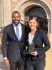 A picture of Elijah Stagger and Lauren Renaud holding up their award from the 0th National Criminal Procedure (Moot Court) Tournament in San Diego