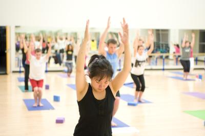 Students do yoga at the Campus Recreation Center