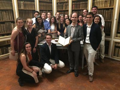 Tech students visit the rare books room at the library at Versailles in France