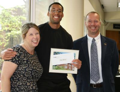 Director of Student Services Dawn Strickland and ISyE School Chair Edwin Romeijn with Alex Berry, recipient of the IISE Excellence in Leadership Award