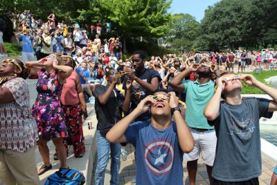 Members of the Georgia Tech community react to Monday&#039;s solar eclipse. (Photo by Renay San Miguel) 