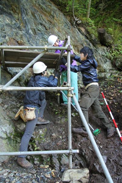 Kazumi Ozaki doing geological field work