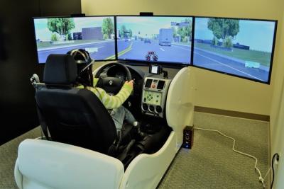 Srinivas Peeta developed this simulator to understand how drivers think and process information behind the wheel. The work has grown to include correlating brain activity and eye movement with what drivers say they think and do behind the wheel.