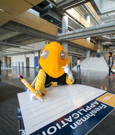 Buzz Fills Out Application