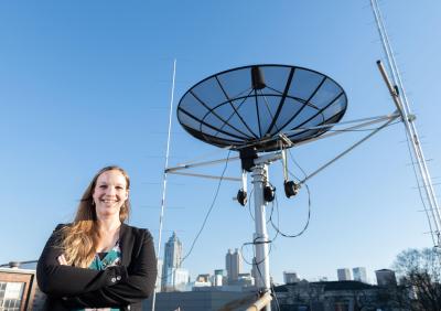 Mariel Borowitz with satellite communications equipment (2)
