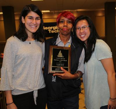 Brenda Harmon, December 2017 Employee of the Month, and two of the students who live in the residence hall where she works - (l-r) Nadin Kosedag (BA major) and Jere Tan (BMED major)