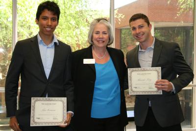 Stewart School Chair Jane Ammons standing with Jose Sarmiento (L) and Alexander Terry (R), recipients of the Stewart School of Industrial &amp; Systems Engineering Leadership Award.