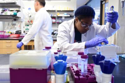 Chemical engineering student in EBB lab