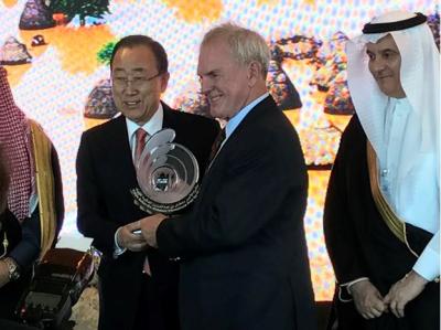 UN Secretary General Ban Ki-Moon (left) presents prize to Peter Webster (center) as PSIPW Chairman Prince Khaled Bin Sultan Bin Abdulaziz looks on during award presentations in New York City on Nov. 2, 2016.