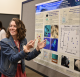 Abigail Johnson and her winning AbSciCon 2022 poster. (Photo: Jennifer Glass)