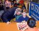 Chess grandmaster Garry Kasparov and 11-year-old Daniel Gurevich. 