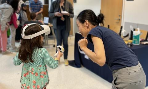 A young participant that is experiencing virtual reality for the first time at Georgia Tech