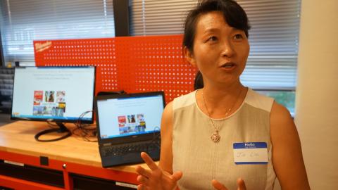 A photo of Georgia Tech School of Modern Languages Associate Professor of Chinese Language and Culture Jin Liu speaking about her project, Building a Digital Resource Center for the Cultural Study of Chinese Dialects, during the 2019 DILAC Dean's Showcase on Wednesday, April 24.