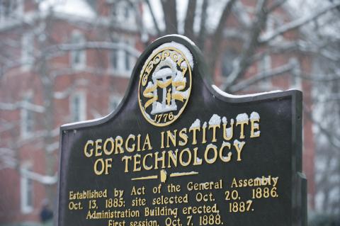 Snow dusts a Georgia Tech sign on campus