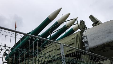 Missile launch rocket launcher behind fencing at a military base for hitting air targets