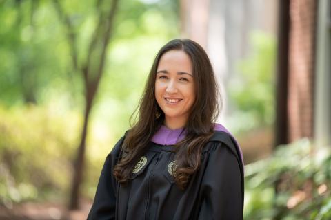 headshot of Heidi Davari in commencement robe
