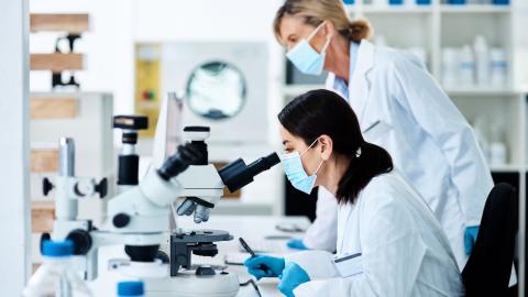 stock photo of two women working in a science lab