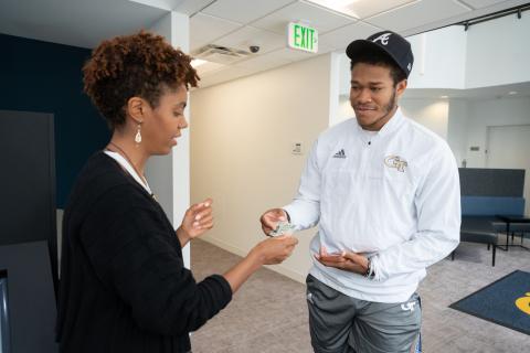 Belinda Person in the Administrative Services Center with Zachary Beckton. 
