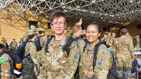 Two AFROTC cadets wearing Operational Camouflage Pattern uniforms.